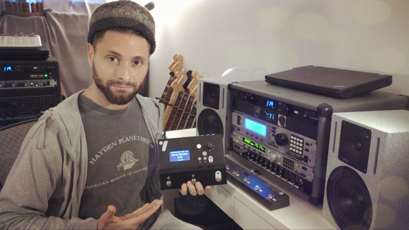 Adam Abenante holding an Idoru P-1